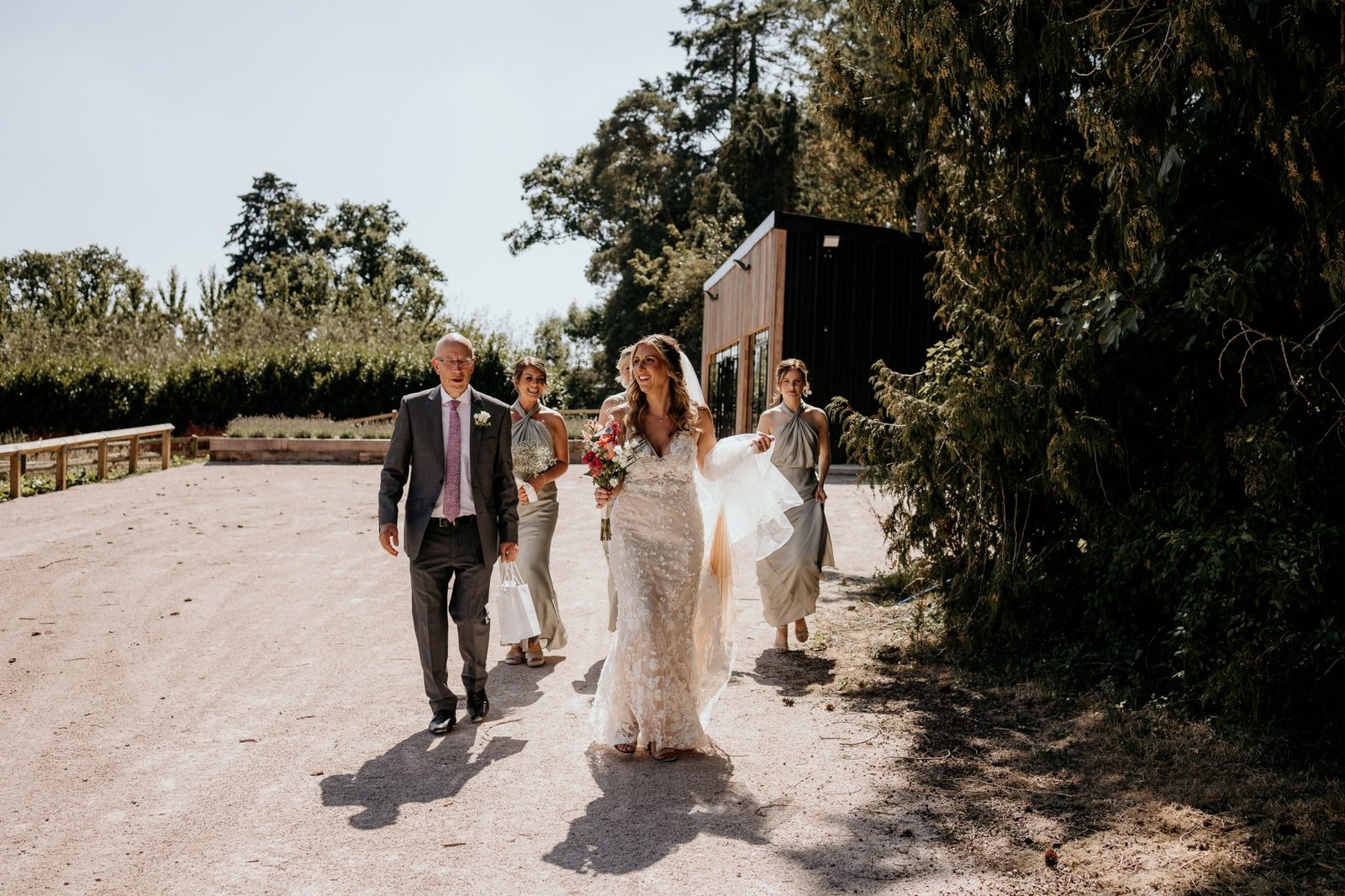 BRIDAL PARTY WALKING TO THE CEREOMONY