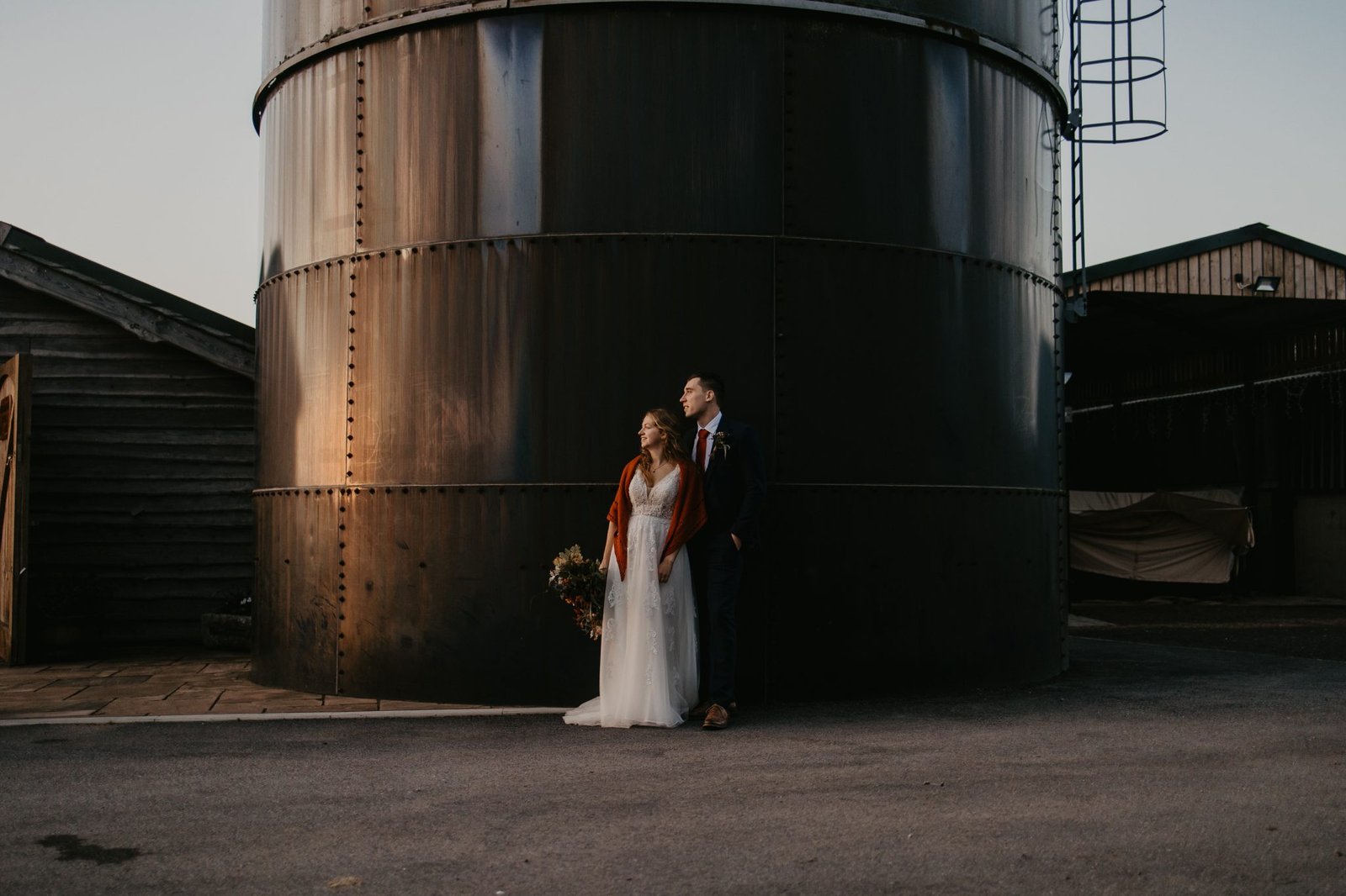 couple in front of silo