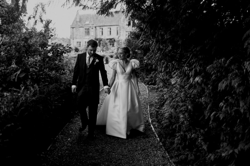 COIPLE WALKING ON THEIR WEDDING DAY