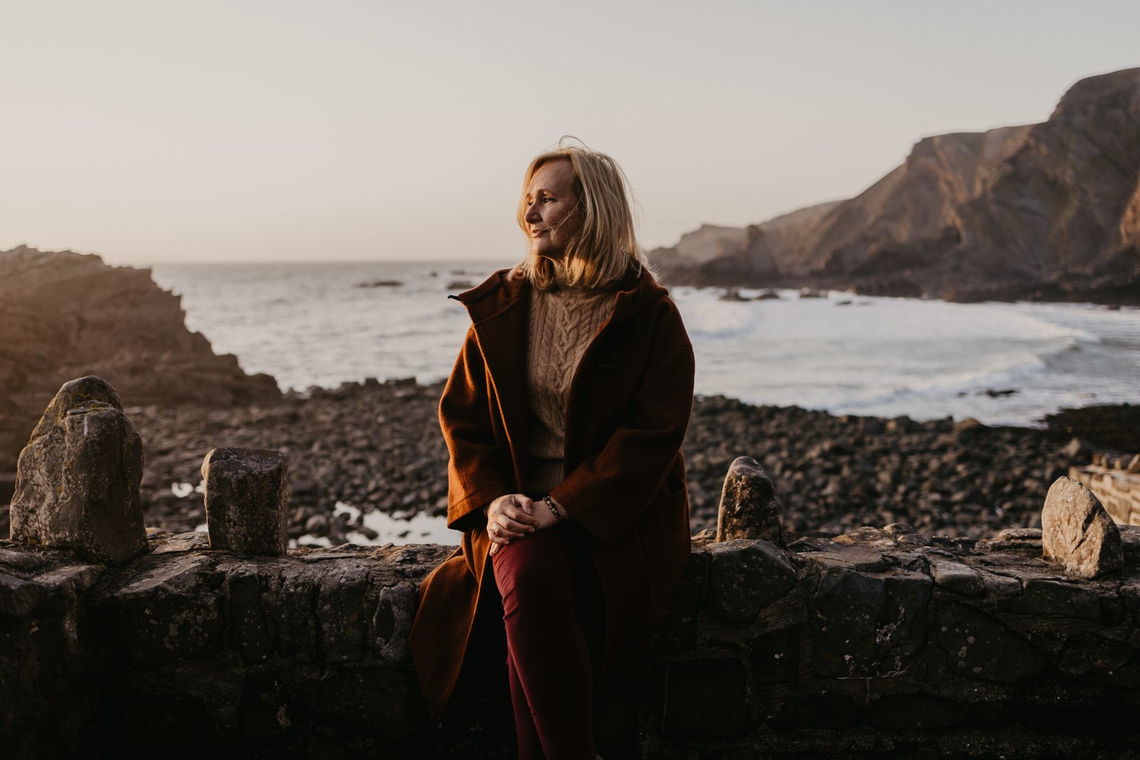 sitting on the harbour wall