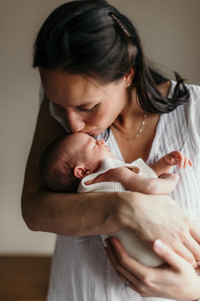 kissing the babies head